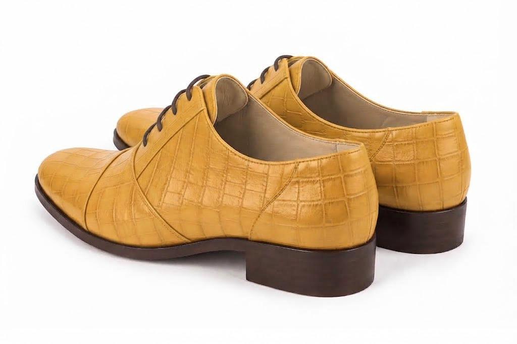 Women's mustard yellow classic oxfords and derby shoes with round toe and chunky rubber lug sole - Rear view